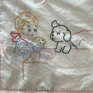 Hand made embroidered pink gingham baby quilt